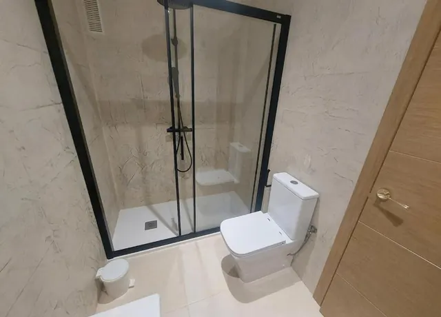 Ducha amplia con mampara